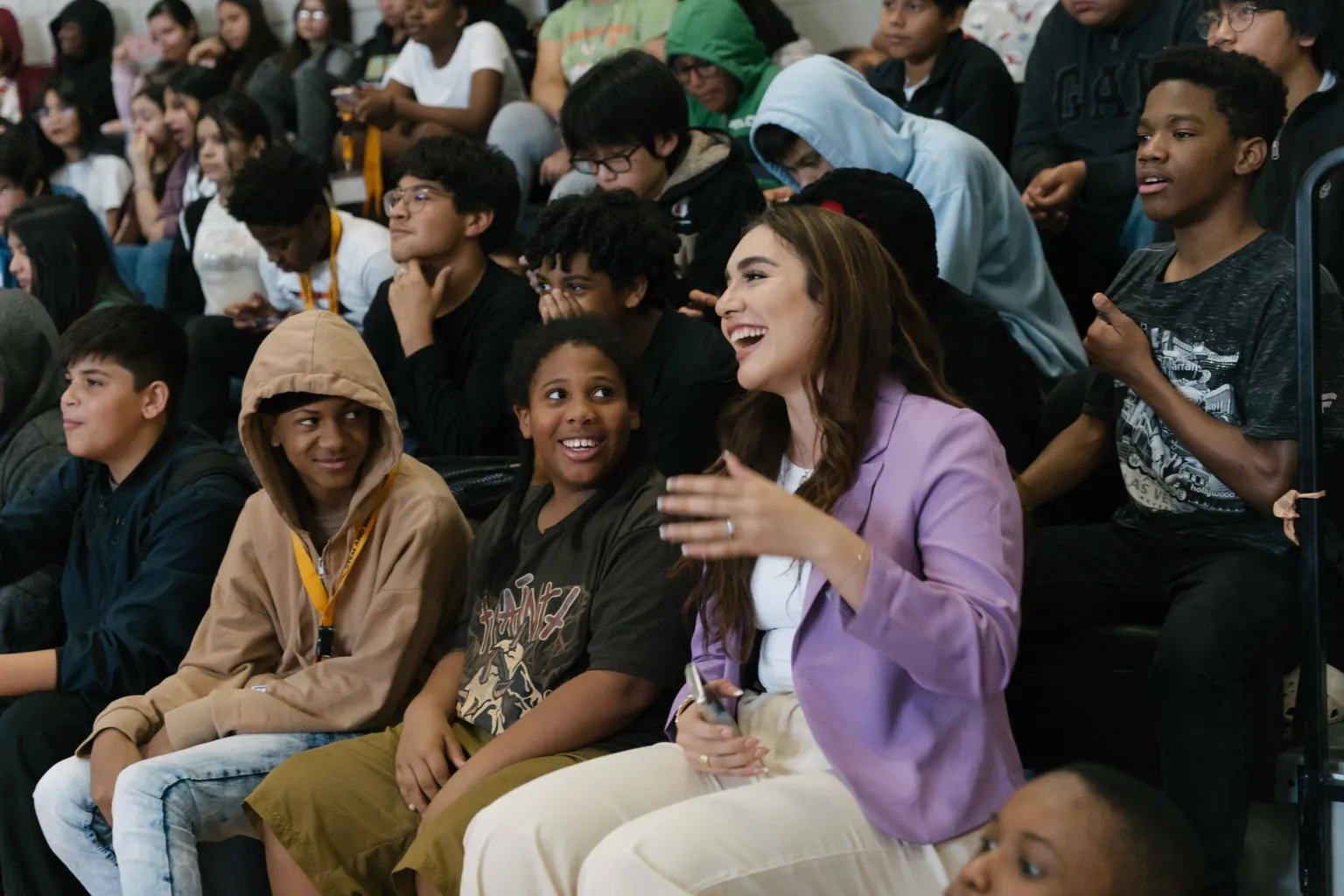 Gina Moreno laughing with students at an Empower Minds event